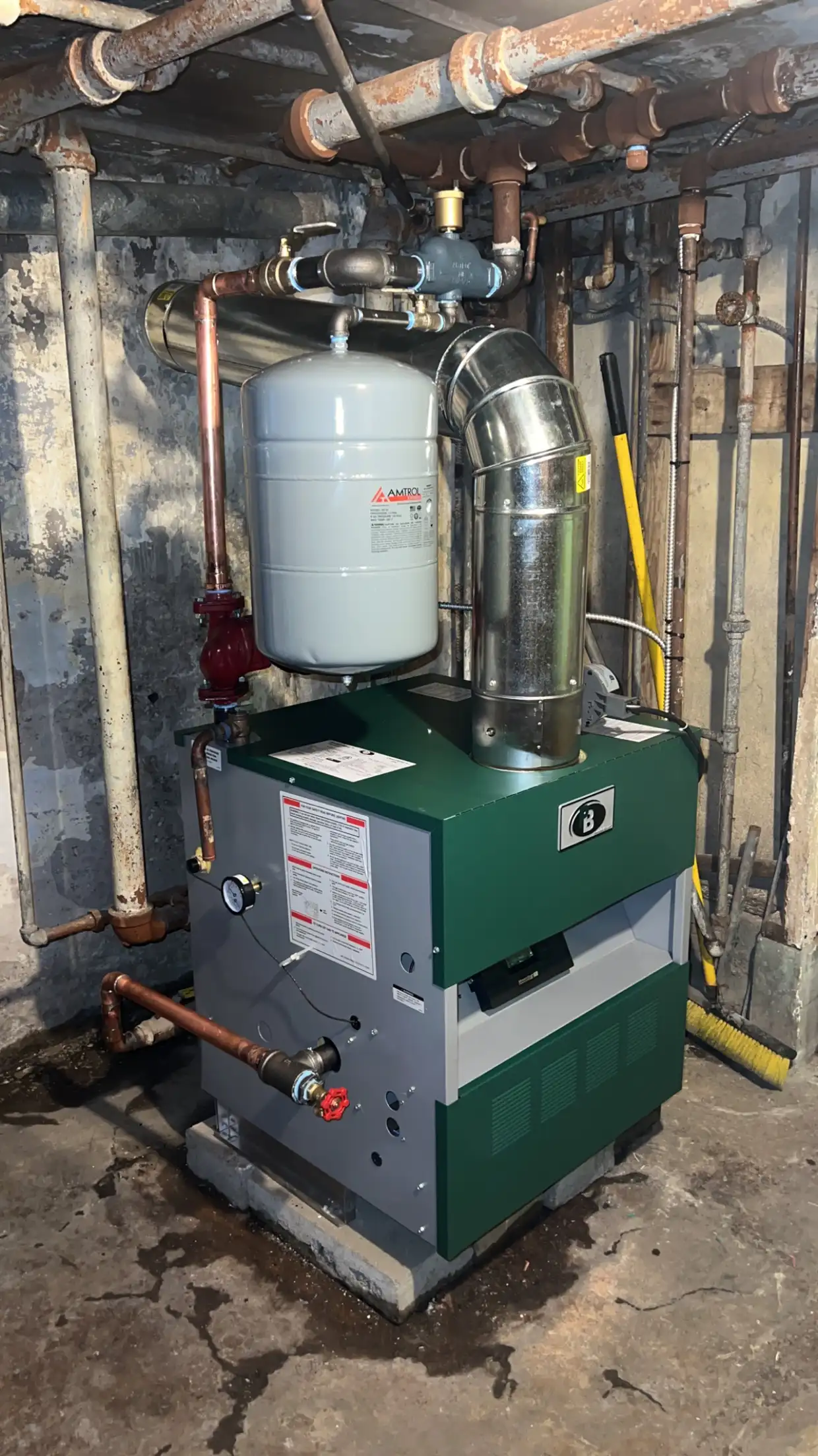 Boiler serviced by a Pro Comfort Solutions technician in a Chicago basement