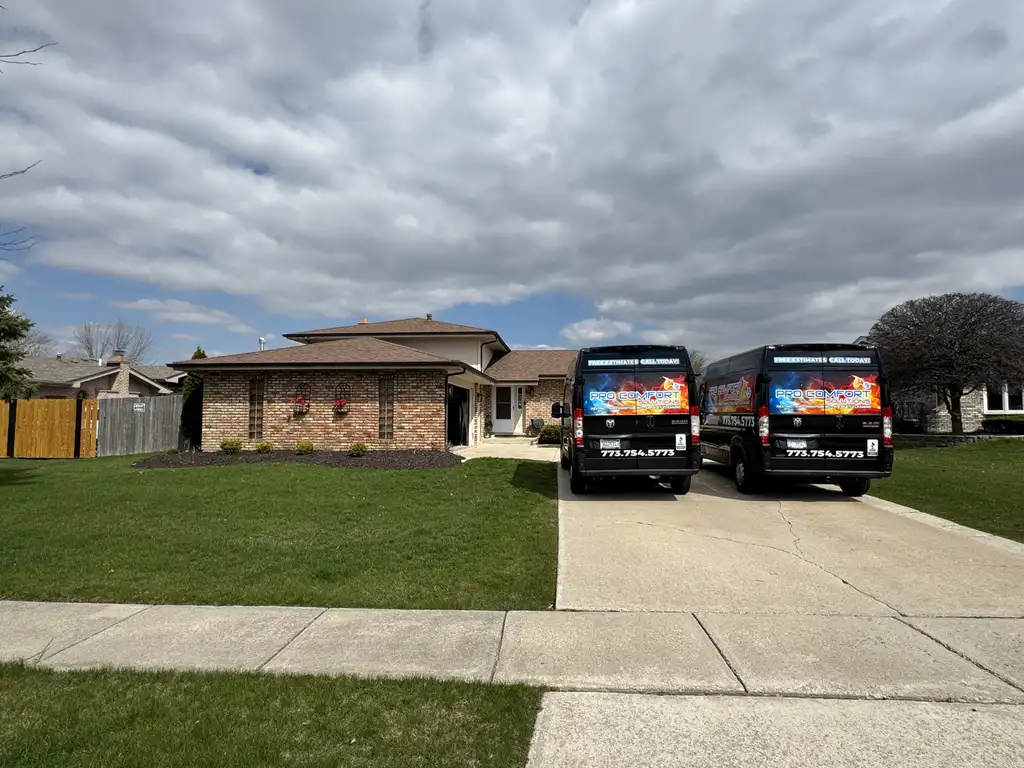 Pro Comfort Solutions service vans lined up and ready for dispatch